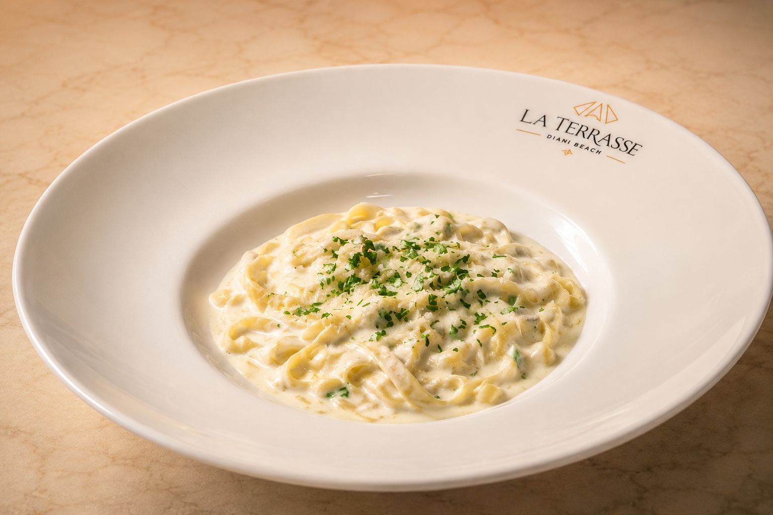 Creamy house pasta served in La Terrasse tableware