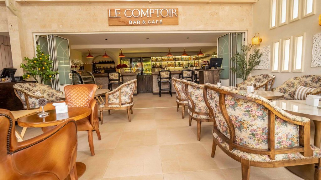 Sophisticated Le Comptoir lounge seating with live piano entertainment in Diani Beach